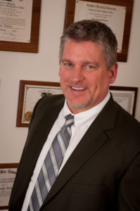 Head-shot of attorney, Paul Dickman