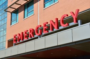 Red emergency sign outside a hospital