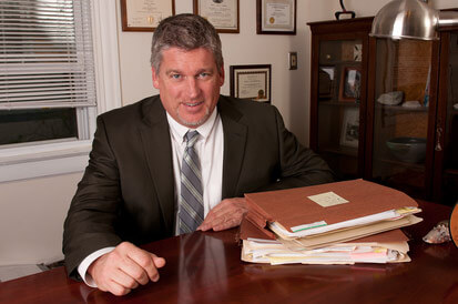 Attorney Paul J. Dickman at his desk